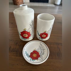 Floral soap dispenser, tooth brush holder, and soap dish